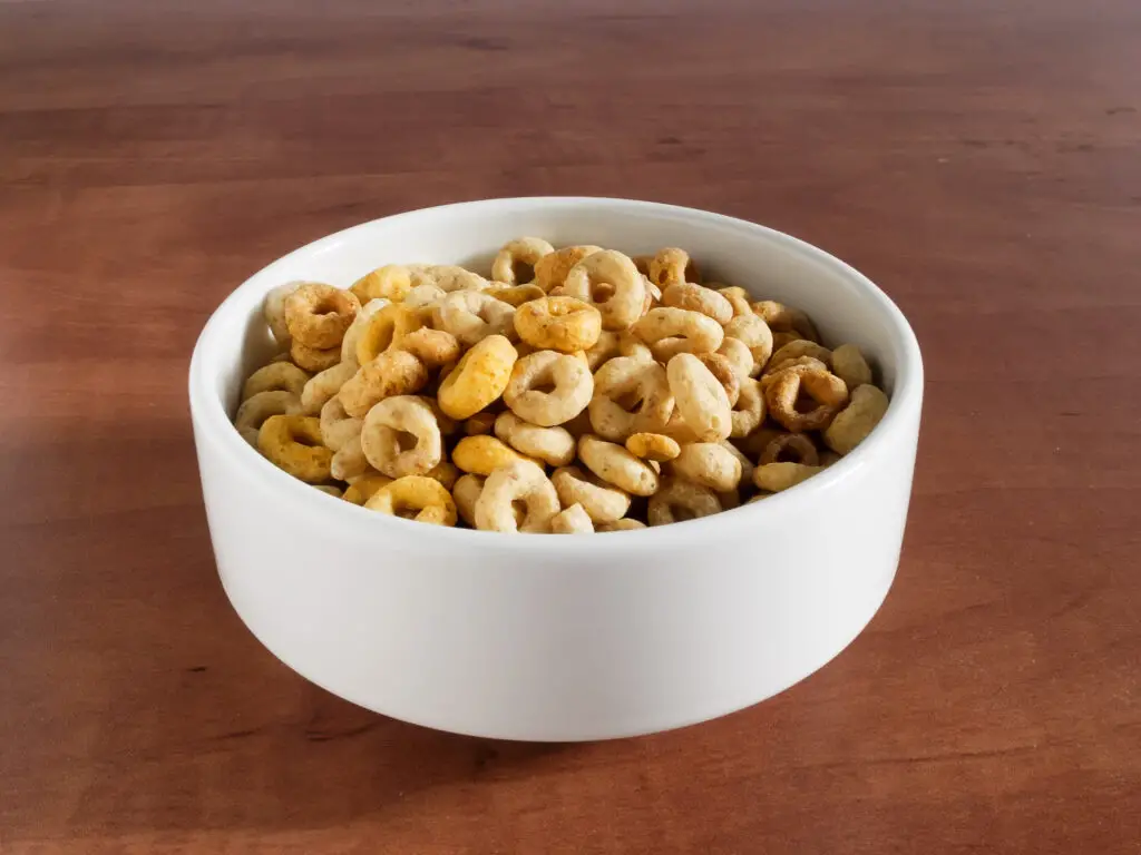 Bowl with cheerios whole grain cereals on a table